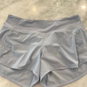 Size 8 used lululemon 4” speed up shorts